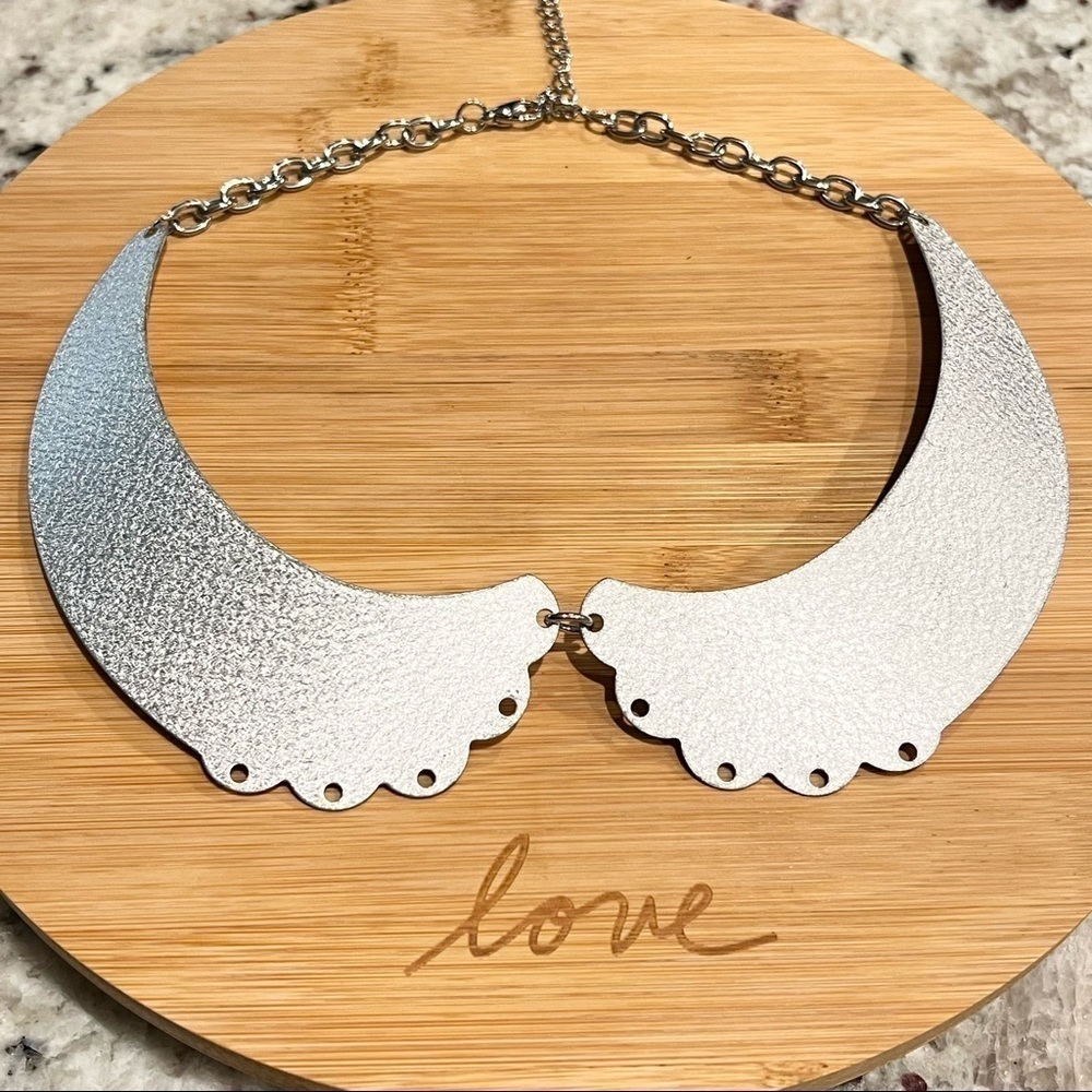 Silver tone textured bib metal necklace